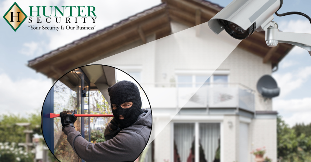 Outdoor security camera catching a burglar attempting a home break-in
